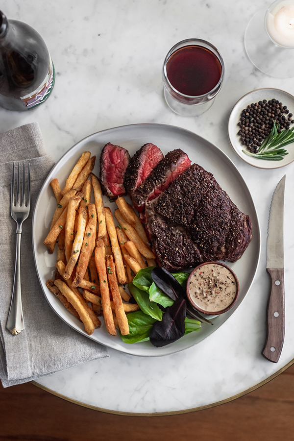 Reverse Seared Chuck Steak with Brandy Peppercorn Sauce: an easy, affordable date-night at home.