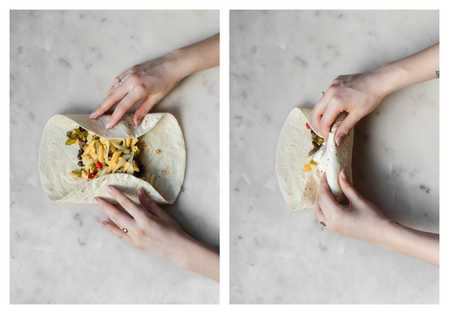 A bird's eye shot of a woman's hands rolling a burrito on a marble backdrop.